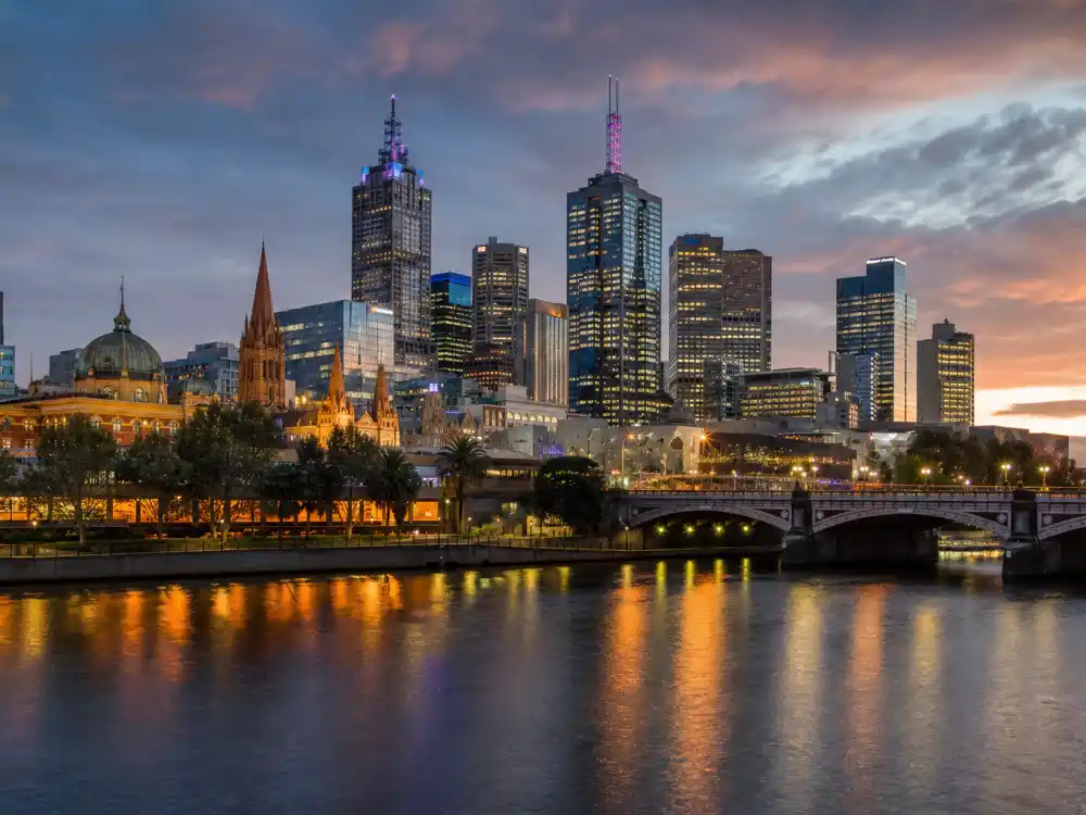 Melbourne Australia skyline evoking how old is Chris Hemsworth birthplace — the Australian city where Christopher Hemsworth was born on August 11, 1983