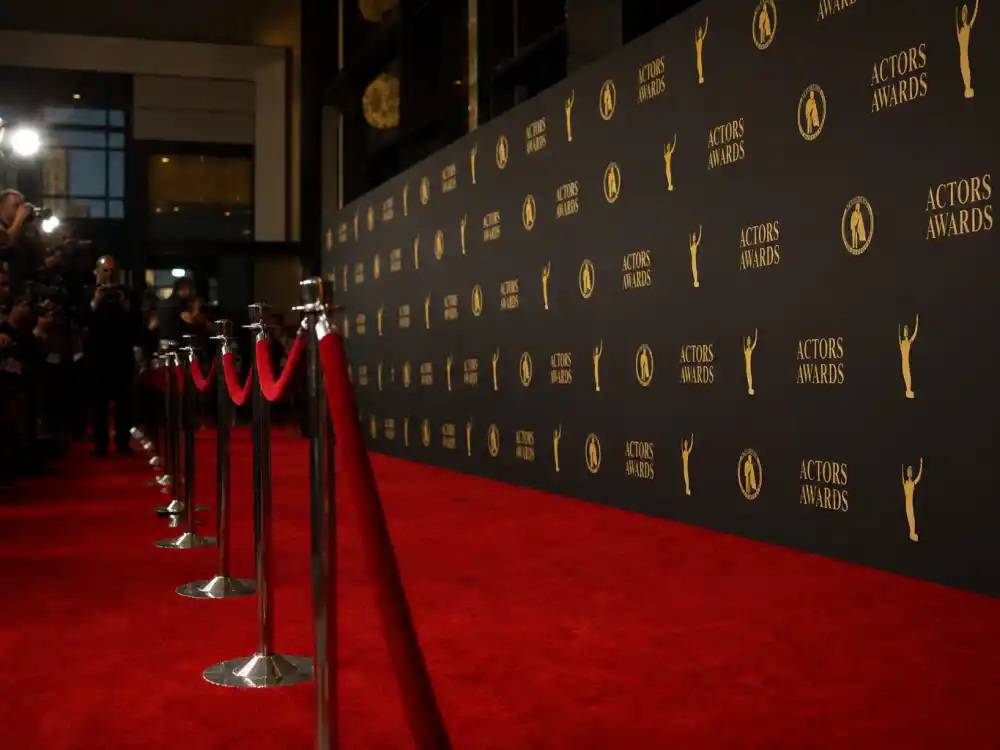 Red carpet premiere display reflecting how old is Daniel Radcliffe at industry peak — franchise milestones and stage drama breakthroughs across three decades