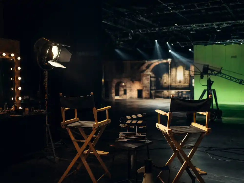 Film studio set reflecting how old is Daniel Radcliffe career arc from child star casting to global franchise dominance and acclaimed stage work