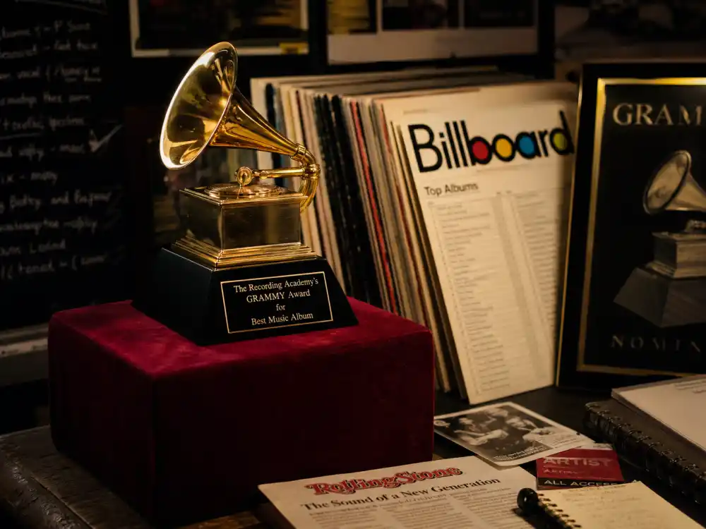 Grammy award trophy display reflecting how old is Doja Cat at her industry peak — chart-topping albums and award-show wins in her late twenties