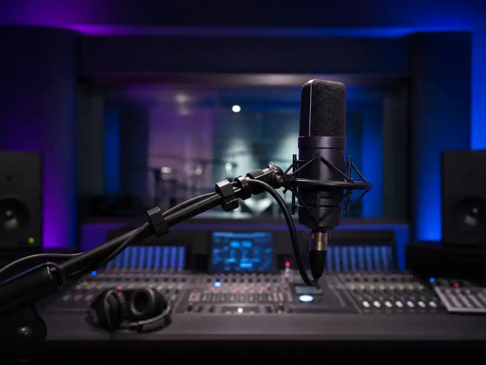Studio microphone from behind for how old is Drake music career editorial without identifiable faces