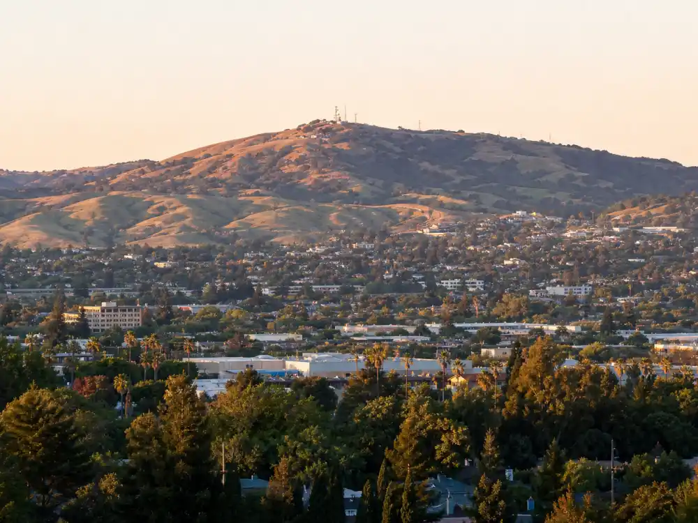 Hayward California Bay Area skyline evoking how old is Dwayne Johnson birthplace — the city where Dwayne Douglas Johnson was born on May 2, 1972