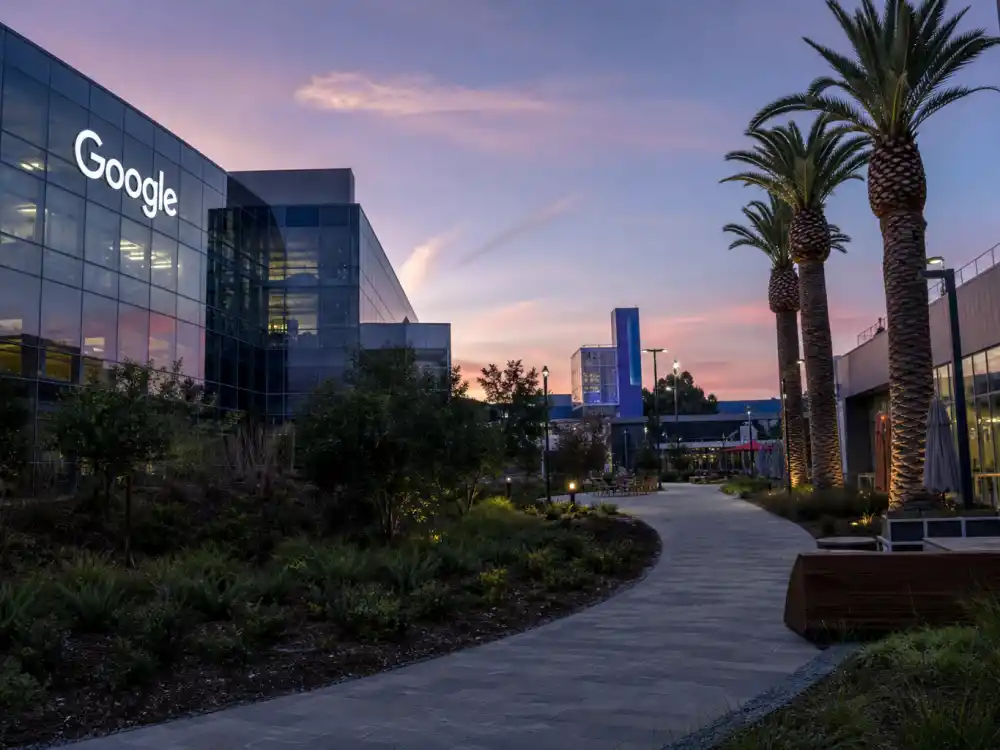 Silicon Valley tech campus exterior reflecting how old is Elon Musk at industry peak — startup roots through aerospace and automotive dominance in his fifties