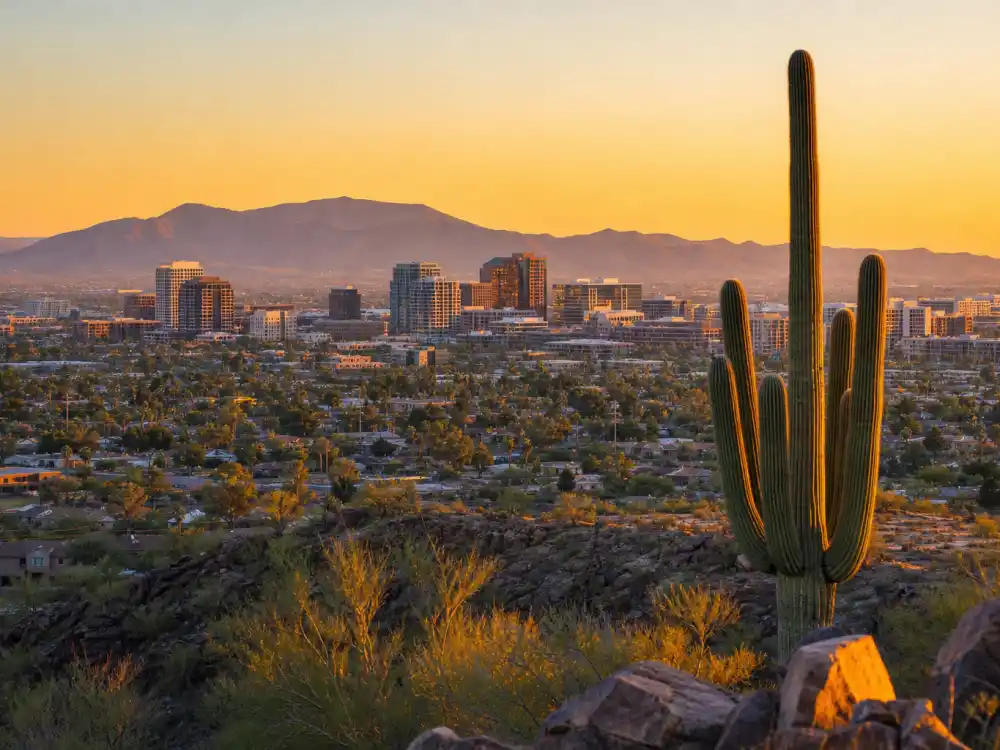 Scottsdale Arizona desert skyline evoking how old is Emma Stone birthplace — the city where Emily Jean Stone was born on November 6, 1988