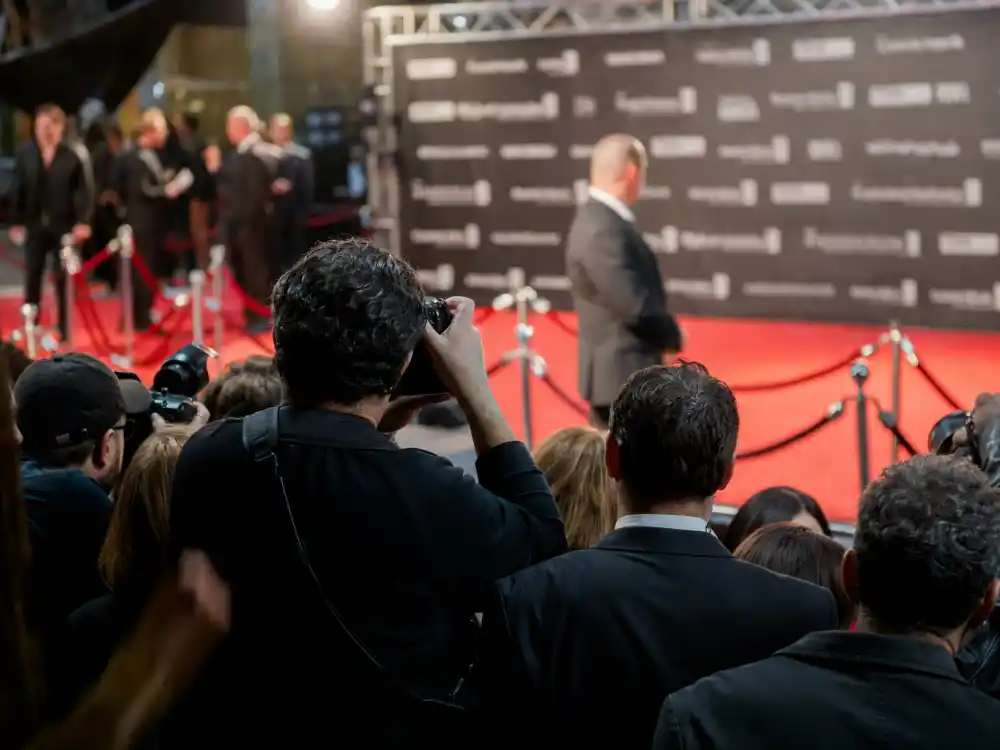 Red carpet premiere display reflecting how old is Emma Watson at industry peak — blockbuster franchise milestones and prestige drama dominance in her twenties and thirties