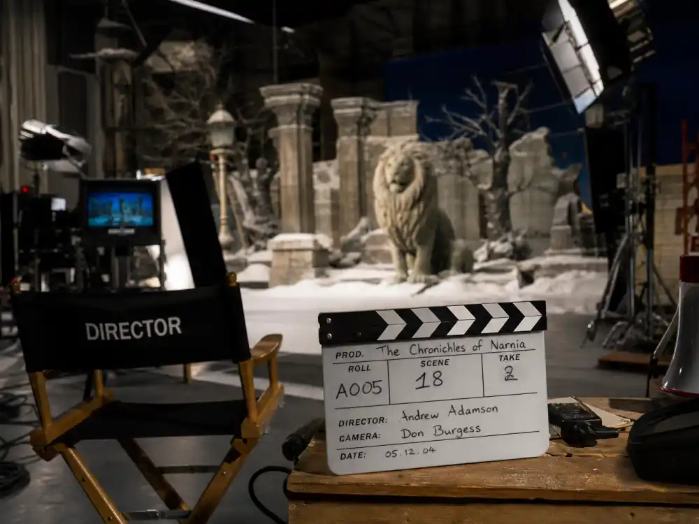 Film studio set reflecting how old is Emma Watson career arc from childhood fantasy blockbuster breakout to prestige drama and activism across three decades