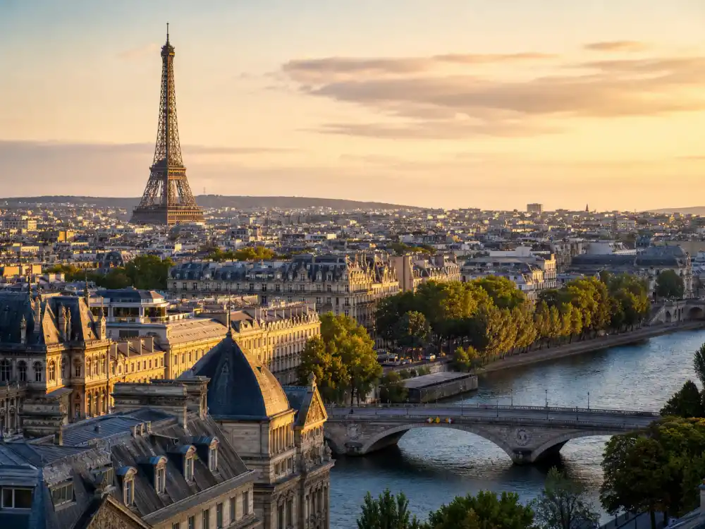 Paris France skyline evoking how old is Emma Watson birthplace — the city where Emma Charlotte Duerre Watson was born on April 15, 1990
