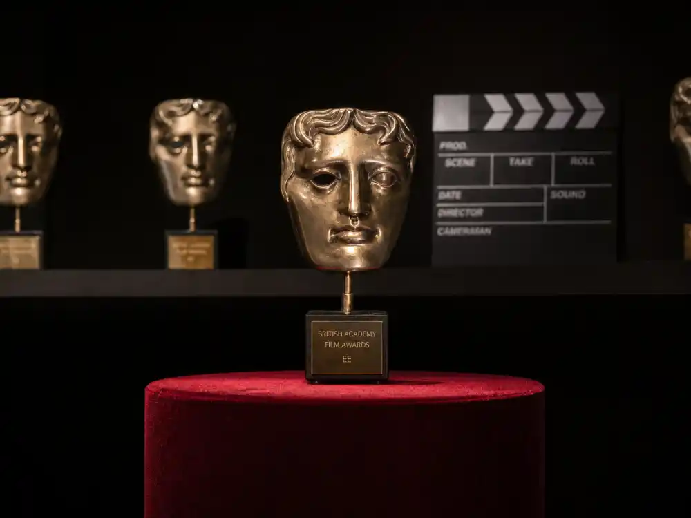 Film festival award trophy display reflecting how old is Florence Pugh at industry peak — Oscar nominations and blockbuster franchise milestones in her twenties