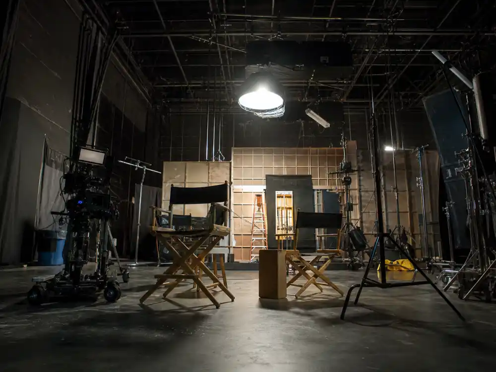 Film studio set reflecting how old is Gal Gadot career arc from Miss Israel breakout to Fast and Furious franchise dominance and Wonder Woman global stardom