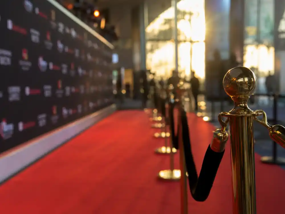 Red carpet premiere display reflecting how old is George Clooney at industry peak — Oscar-winning milestones and blockbuster franchise dominance in his forties and sixties