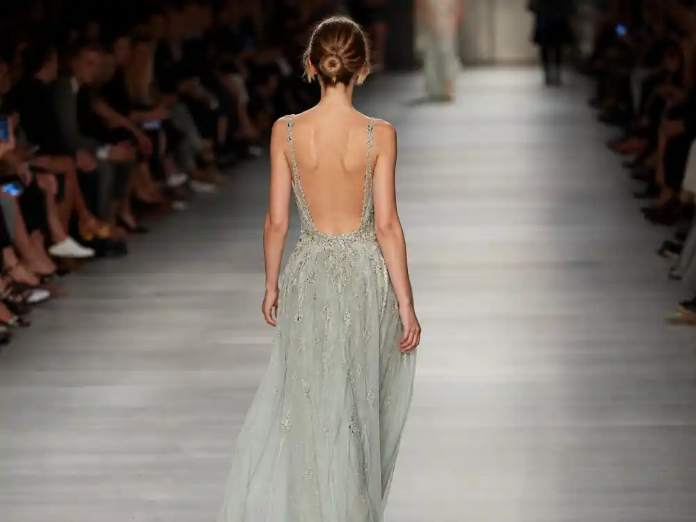 Fashion runway backstage reflecting how old is Hailey Bieber at industry peak — modeling roots through beauty entrepreneurship growth in her twenties