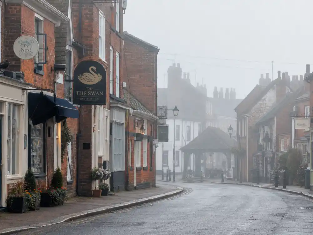 English village high street evoking how old is Harry Styles birthplace — Redditch, Worcestershire, where he was born on February 1, 1994
