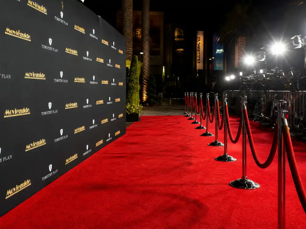 Red carpet premiere display reflecting how old is Henry Cavill at industry peak — blockbuster franchise milestones and action-film dominance across two decades