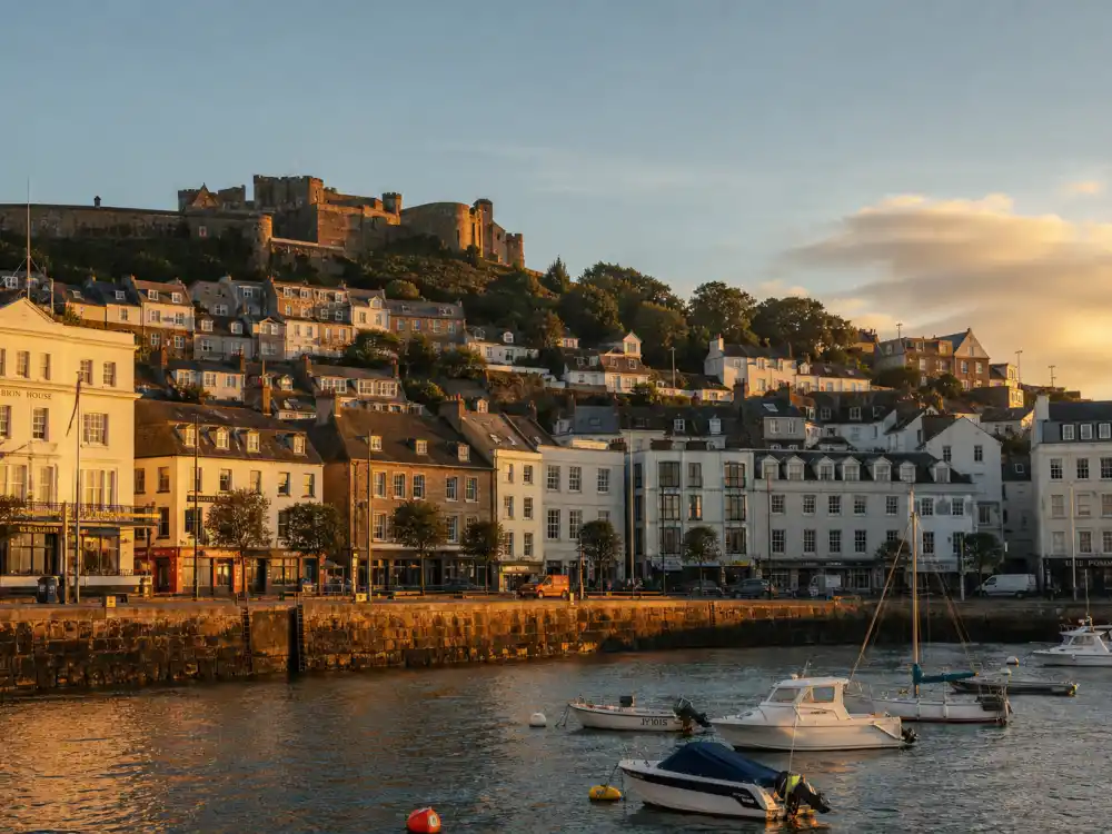 Jersey Channel Islands coastal harbor evoking how old is Henry Cavill birthplace — Saint Helier where Henry William Dalgliesh Cavill was born on May 5, 1983