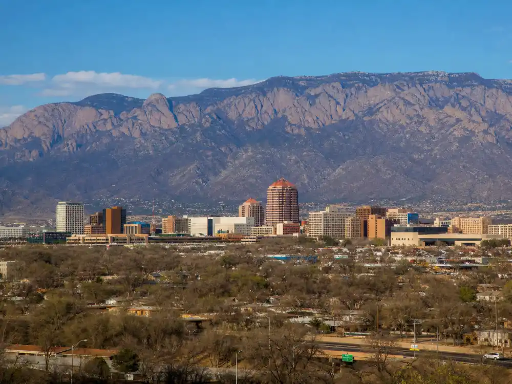 Albuquerque New Mexico skyline evoking how old is Jeff Bezos birthplace — the city where Jeffrey Preston Jorgensen was born on January 12, 1964