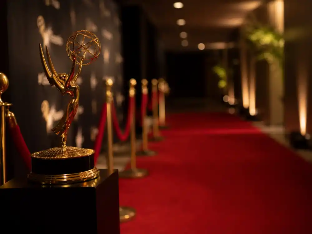 Emmy award and red carpet premiere display reflecting how old is Jennifer Aniston at industry peak — sitcom icon status and acclaimed drama roles in her fifties