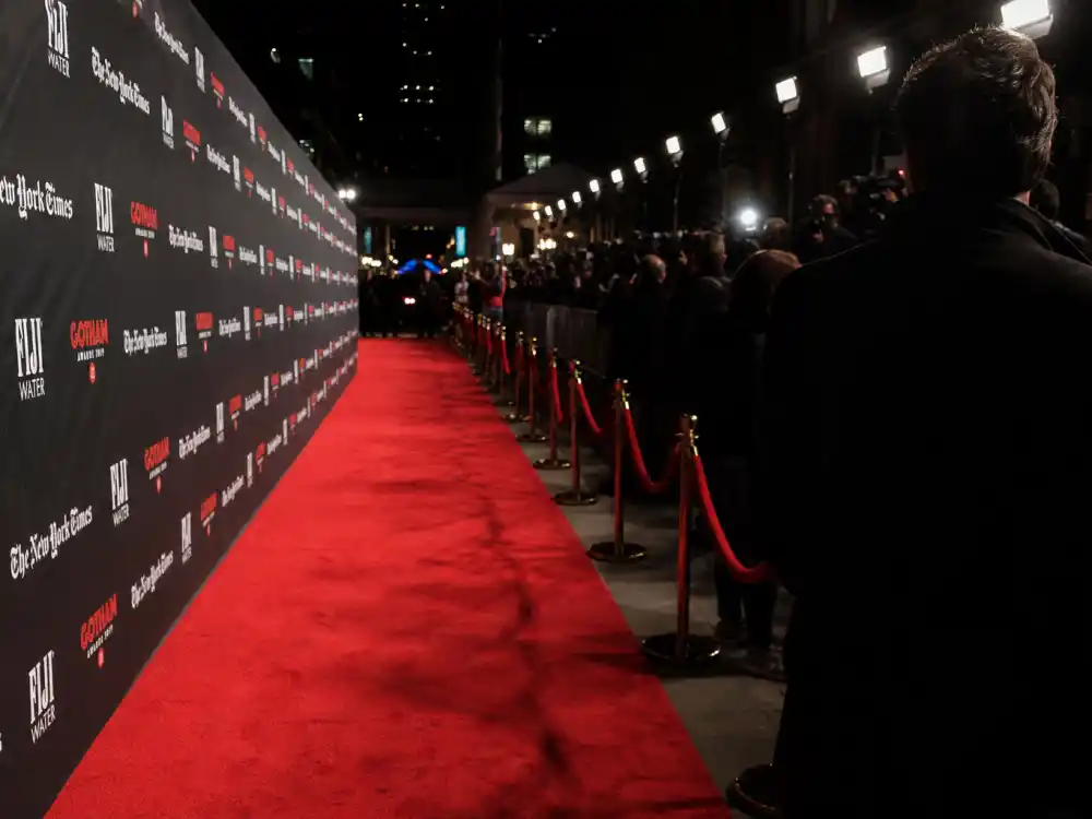 Red carpet premiere display reflecting how old is John Krasinski at industry peak — blockbuster milestones and director-franchise dominance in his mid-forties