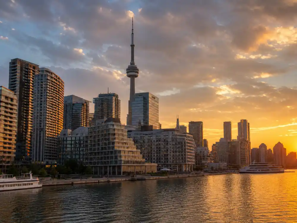 Toronto Canada skyline evoking how old is Keanu Reeves upbringing — the city where Keanu Reeves was raised after his September 2, 1964 birth in Beirut