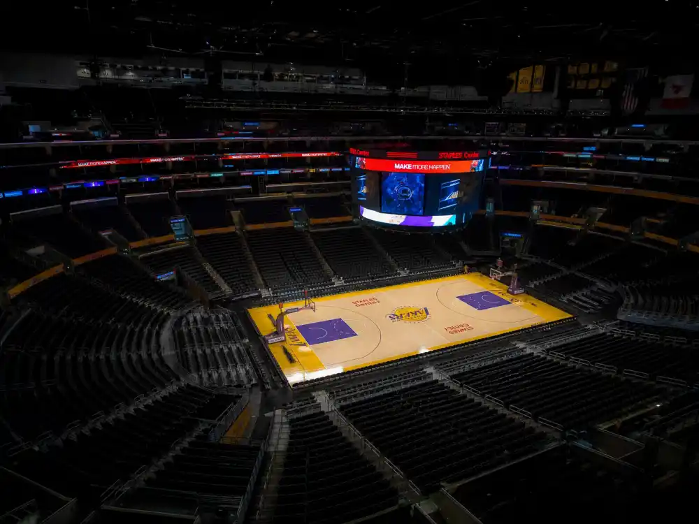 NBA arena interior reflecting how old is Kevin Durant at industry peak — championship runs and All-Star dominance across Oklahoma City, Golden State, and Phoenix eras
