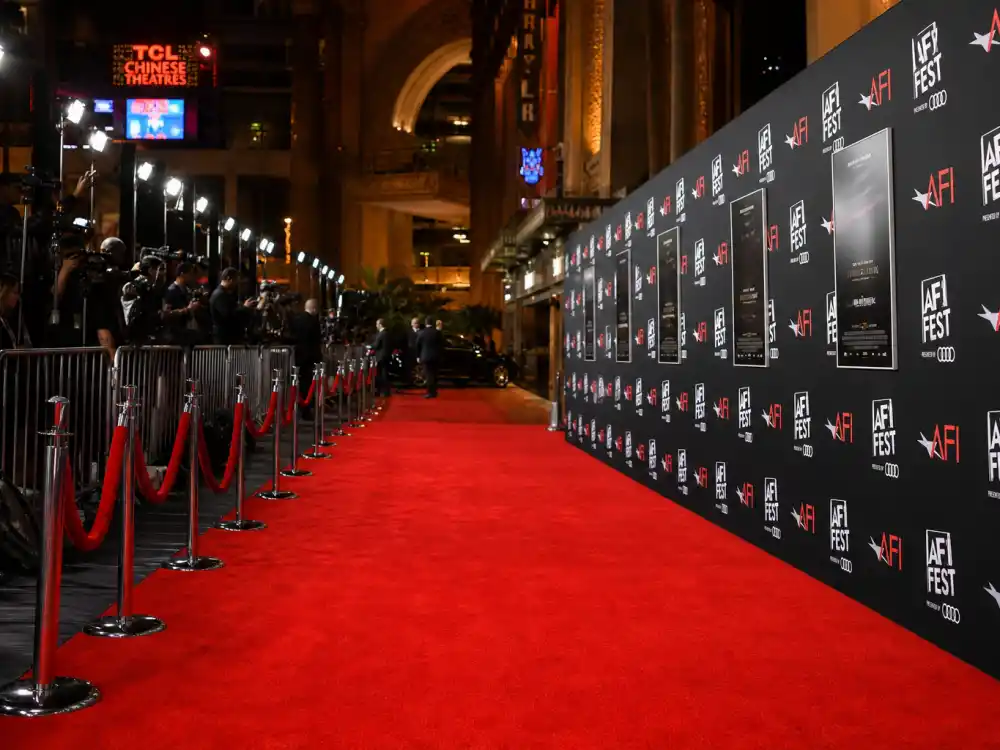 Red carpet premiere display reflecting how old is Kevin Hart at industry peak — blockbuster comedy films and arena tour milestones in his forties
