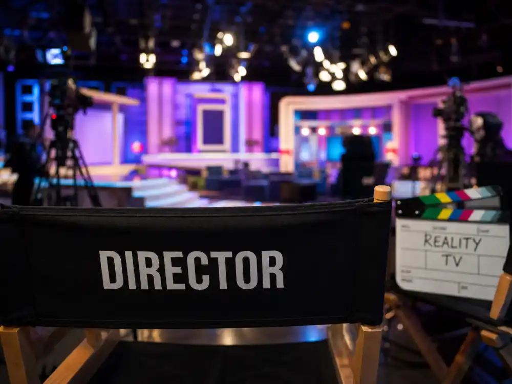 Television studio set reflecting how old is Kim Kardashian career arc from early 2000s media presence to global reality TV and business superstardom