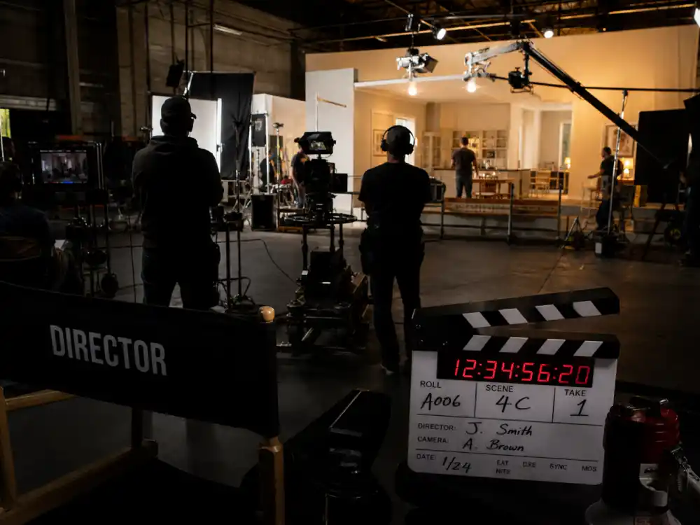 Film studio set reflecting how old is Leonardo DiCaprio career arc from 1990s teen breakout to Oscar-winning blockbuster dominance