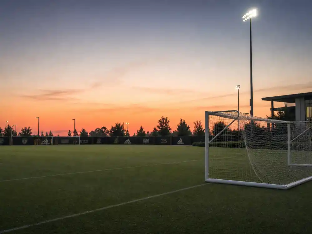 Soccer training pitch reflecting how old is Lionel Messi career arc from Rosario youth programs to Barcelona legend and Inter Miami captain