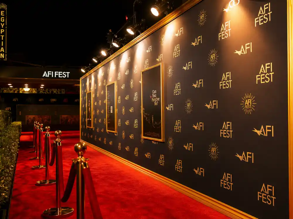 Red carpet premiere display reflecting how old is Lupita Nyongo at industry peak — Oscar milestones and blockbuster franchise dominance in her early forties