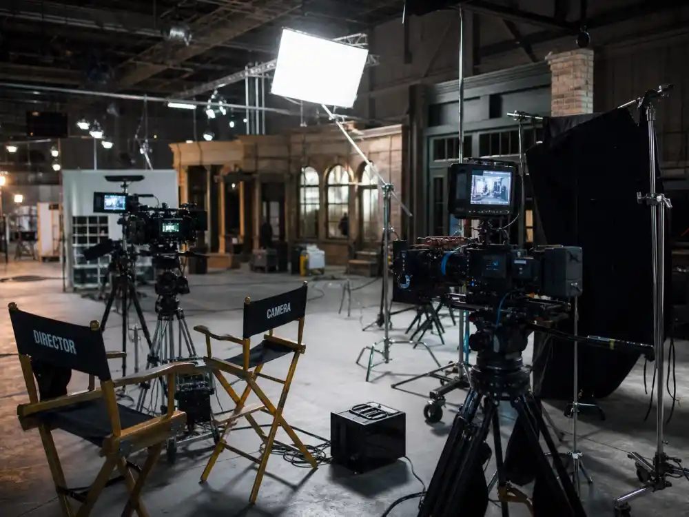 Film studio set reflecting how old is Mark Wahlberg career arc from Marky Mark music breakout to Oscar-nominated drama and global blockbuster action dominance