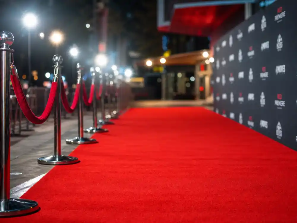 Red carpet premiere display reflecting how old is Millie Bobby Brown at industry peak — Emmy-nominated milestones and blockbuster franchise dominance in her twenties