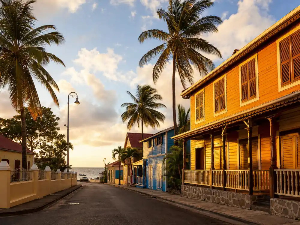 Trinidad and Tobago coastal street evoking how old is Nicki Minaj birthplace — Saint James where Onika Tanya Maraj was born on December 8, 1982