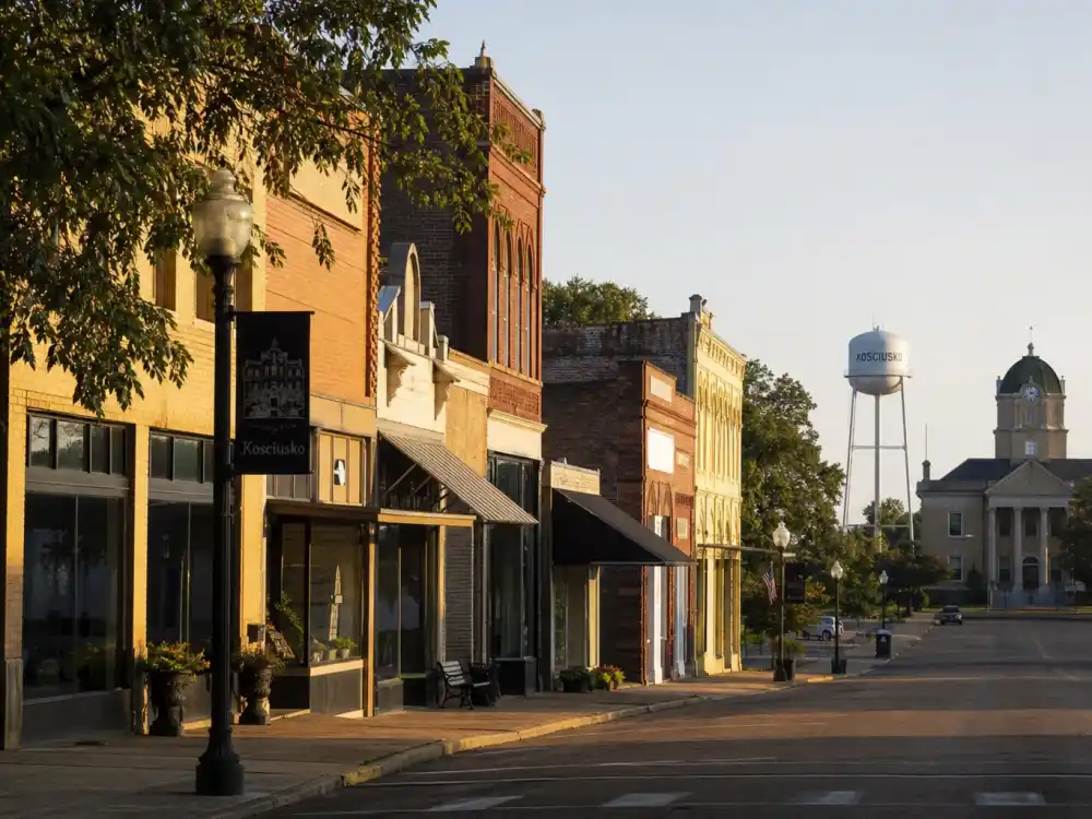 Kosciusko Mississippi main street evoking how old is Oprah Winfrey birthplace — the town where Orpah Gail Winfrey was born on January 29, 1954