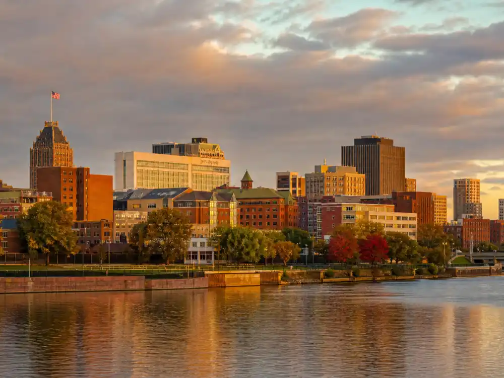 Syracuse New York skyline near where Post Malone was born on July 4, 1995 — how old is Post Malone birthplace context