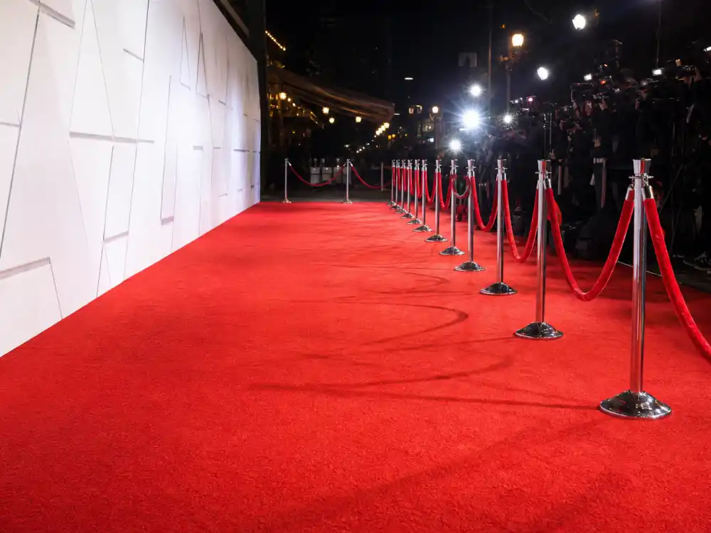 Red carpet premiere display reflecting how old is Reese Witherspoon at industry peak — Oscar-winning milestones and blockbuster franchise dominance in her twenties and fifties