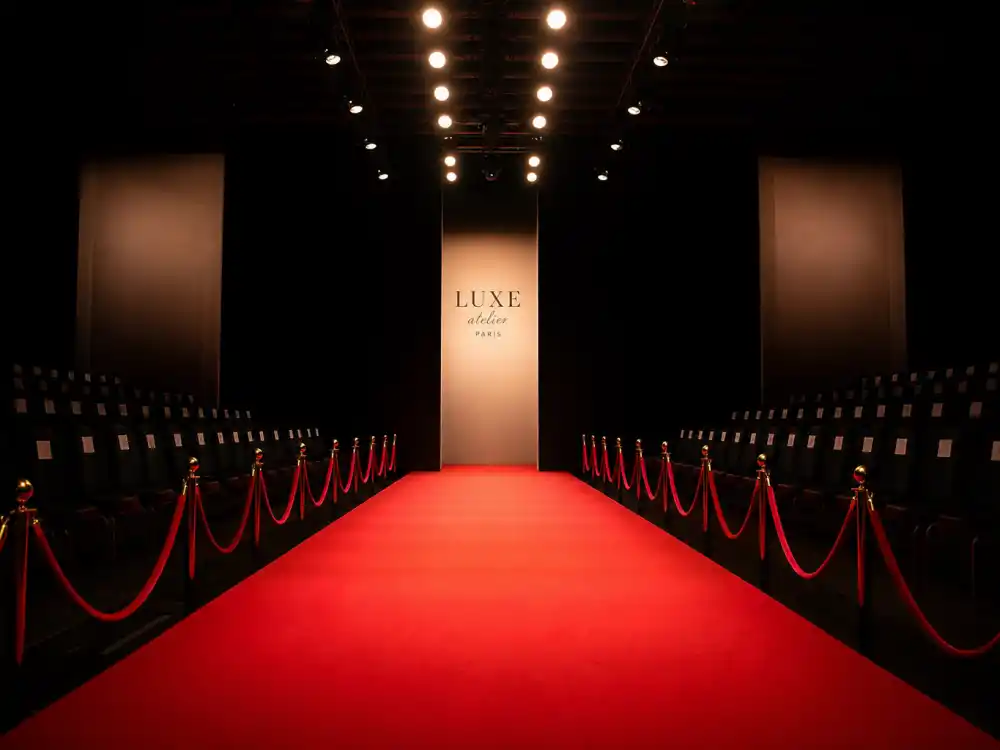 Fashion runway stage for how old is Rihanna red carpet milestone editorial without identifiable faces