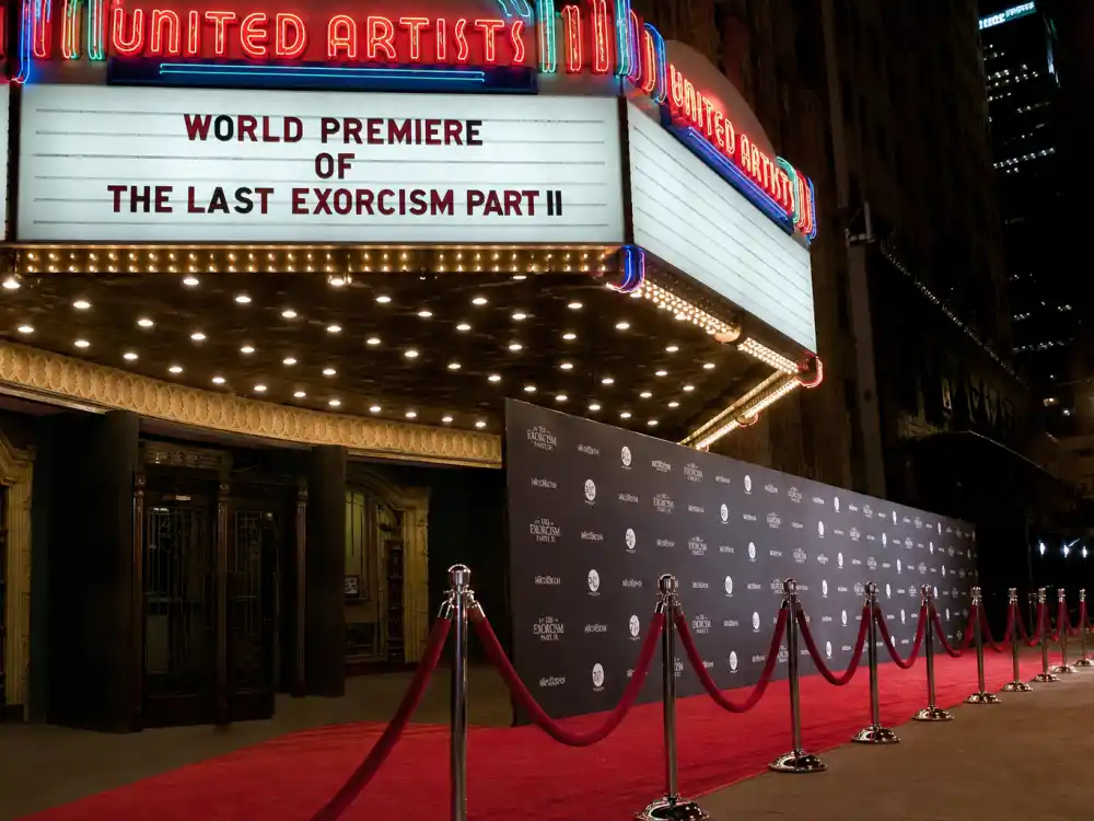 Theater marquee and film premiere display reflecting how old is Ryan Gosling at industry peak — Oscar nominations and blockbuster milestones in his forties