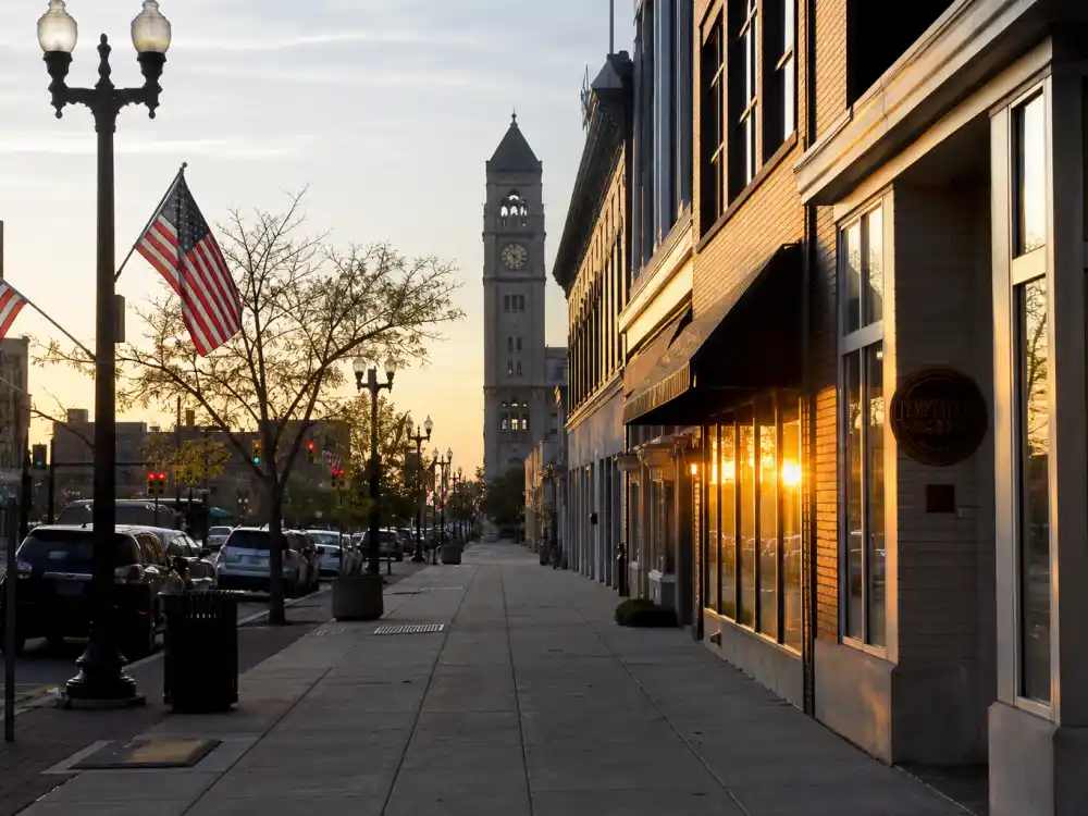 Saginaw Michigan suburban skyline evoking how old is Serena Williams birthplace — the city where Serena Jameka Williams was born on September 26, 1981