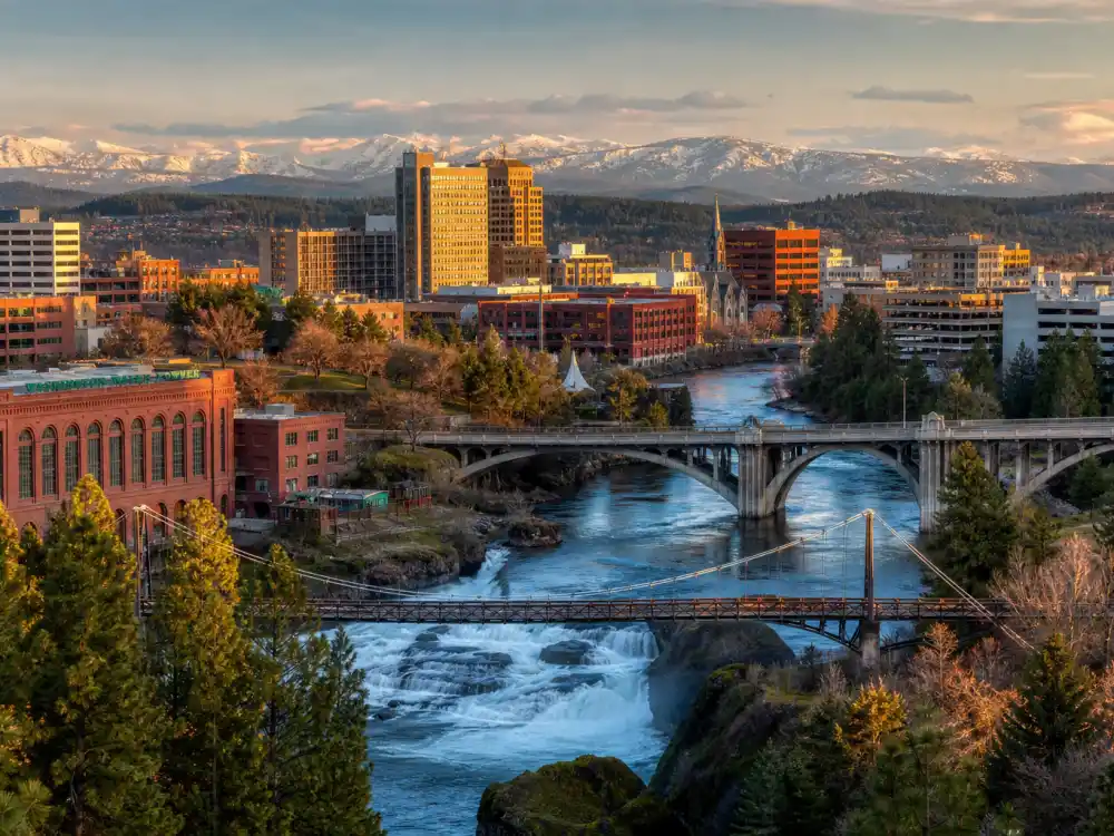 Spokane Washington skyline evoking how old is Sydney Sweeney birthplace — the city where Sydney Bernice Sweeney was born on September 12, 1997