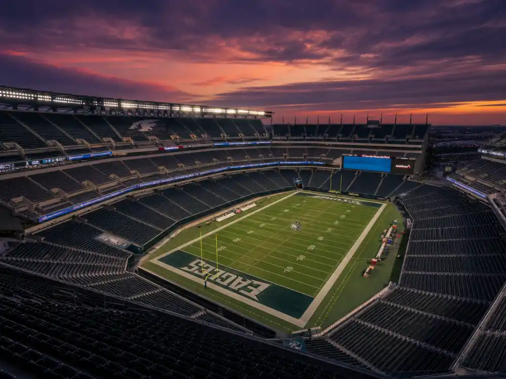 NFL stadium interior reflecting how old is Tom Brady at industry peak — Super Bowl runs and record-setting longevity across a twenty-three-season professional career