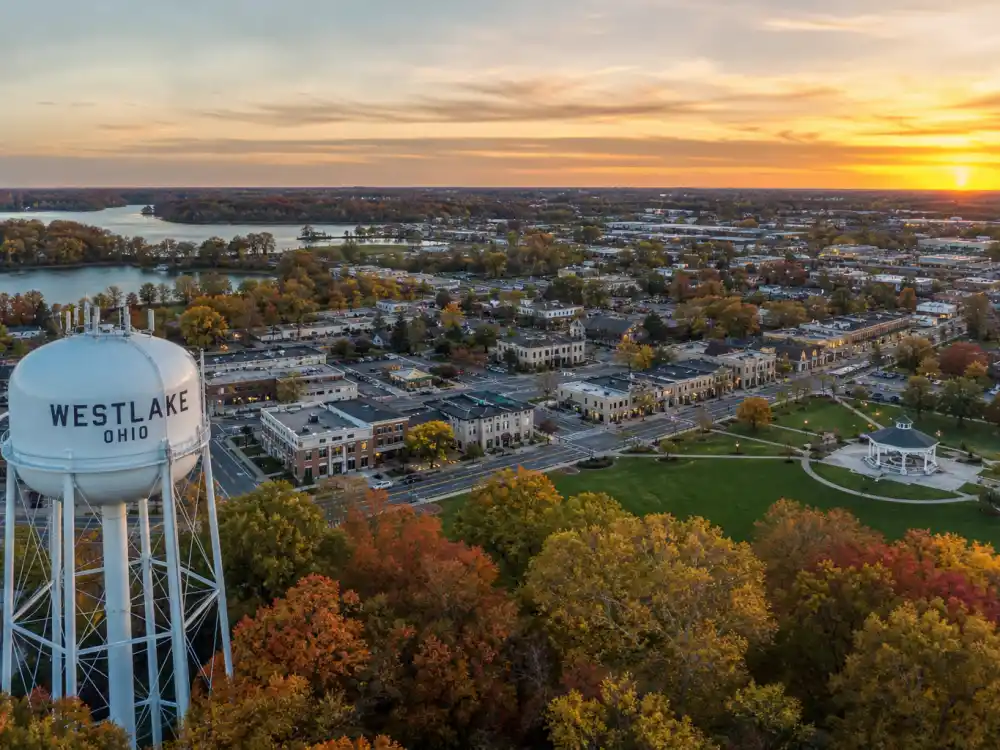 Westlake Ohio suburban skyline evoking how old is Travis Kelce birthplace — the Cleveland-area city where Travis Michael Kelce was born on October 5, 1989