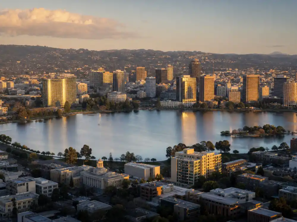 Oakland California skyline evoking how old is Zendaya birthplace — the city where Zendaya Maree Stoermer Coleman was born on September 1, 1996