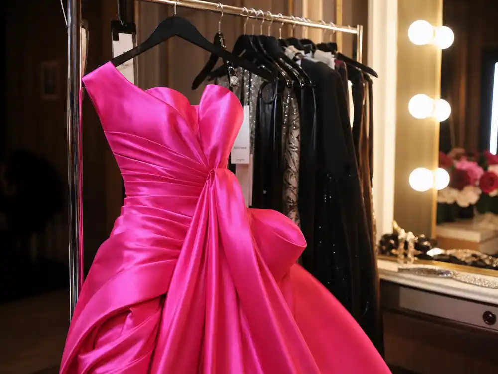 Hot pink satin couture gown defining how to dress like Florence Pugh red carpet bold color risk on premiere night
