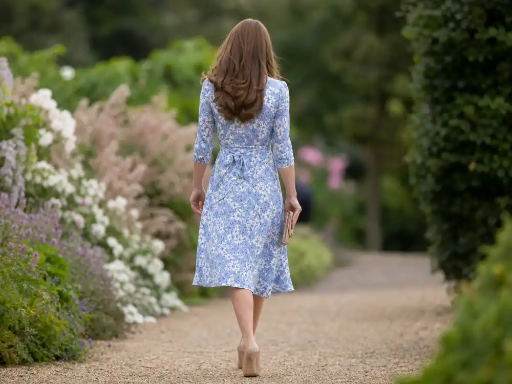 Floral wrap midi dress behind how to dress like Kate Middleton classic fashion countryside wardrobe rotation