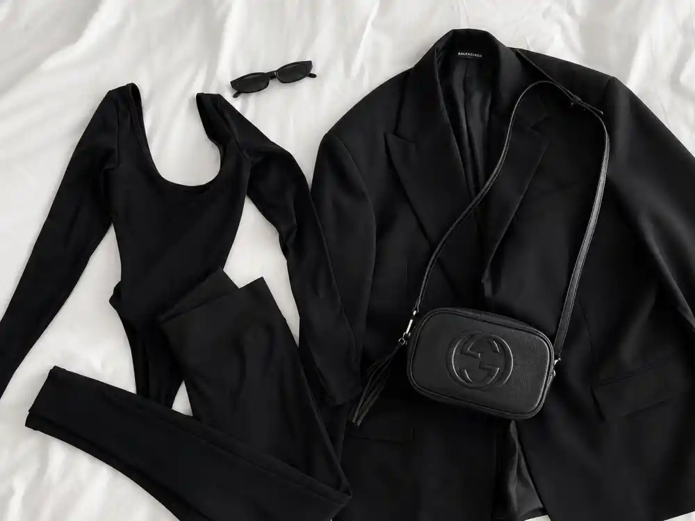 All-black monochrome casual flat lay behind how to dress like Kim Kardashian casual neutral discipline