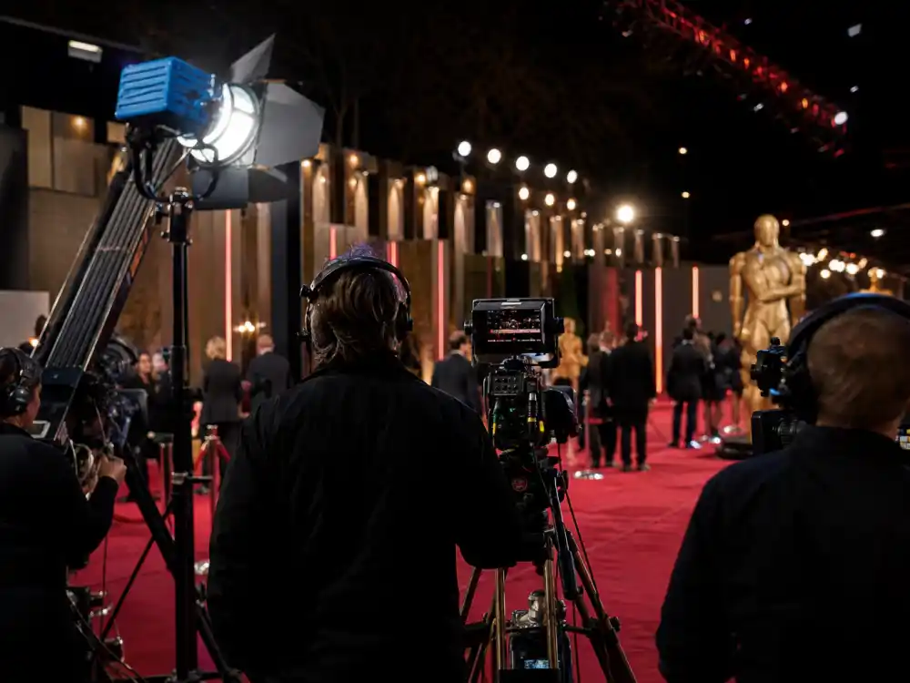 Broadcast cameras on the Grammy pre-show red carpet where how to watch the Grammys 2027 coverage begins hours before the CBS telecast