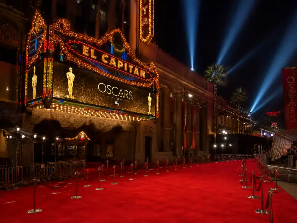 Dolby Theatre exterior at night with red carpet for how to watch the Oscars 2027 date and time ceremony broadcast from Hollywood