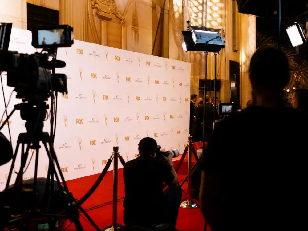 Red carpet pre-show broadcast cameras and step-and-repeat backdrop for how to watch the Oscars 2027 date and time arrivals coverage on Oscar Sunday