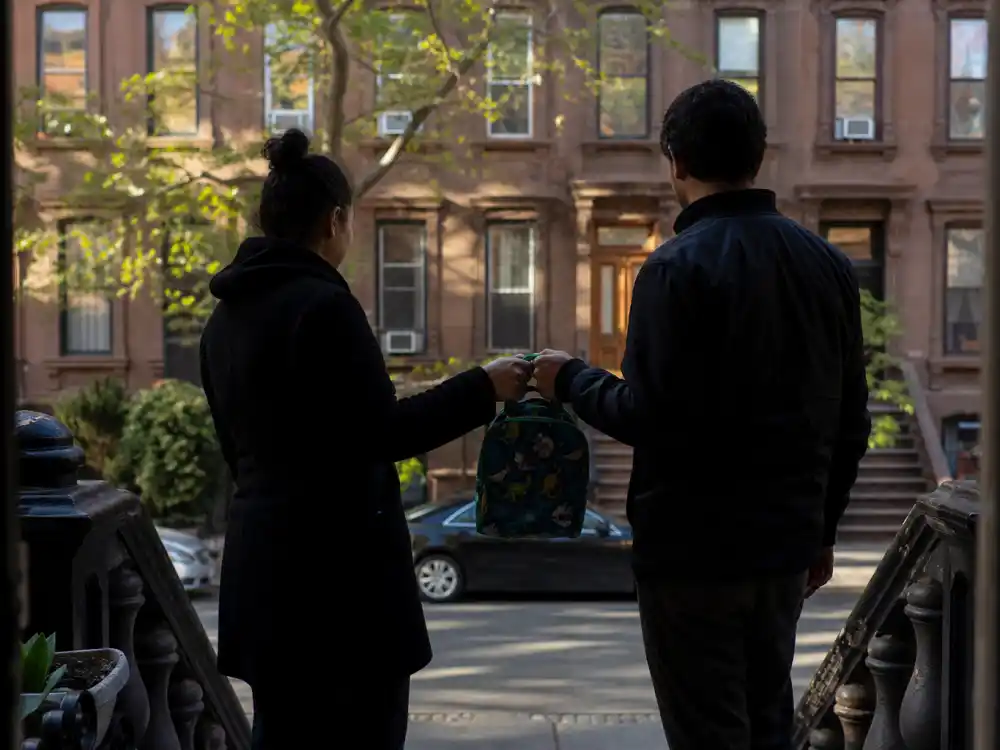 Amicable co-parent silhouettes on NYC brownstone stoop for Hugh Jackman adoption journey explained 2023 separation context without identifiable faces