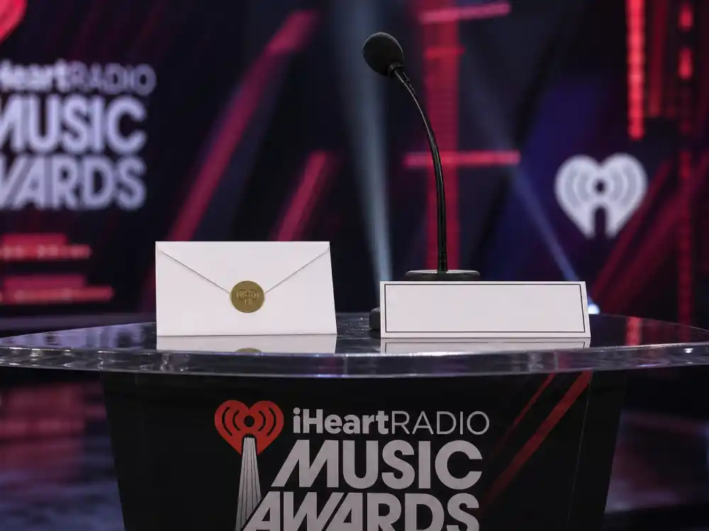 Sealed envelope on awards podium before reveal of iHeartRadio Music Awards 2026 winners on March 26 FOX broadcast