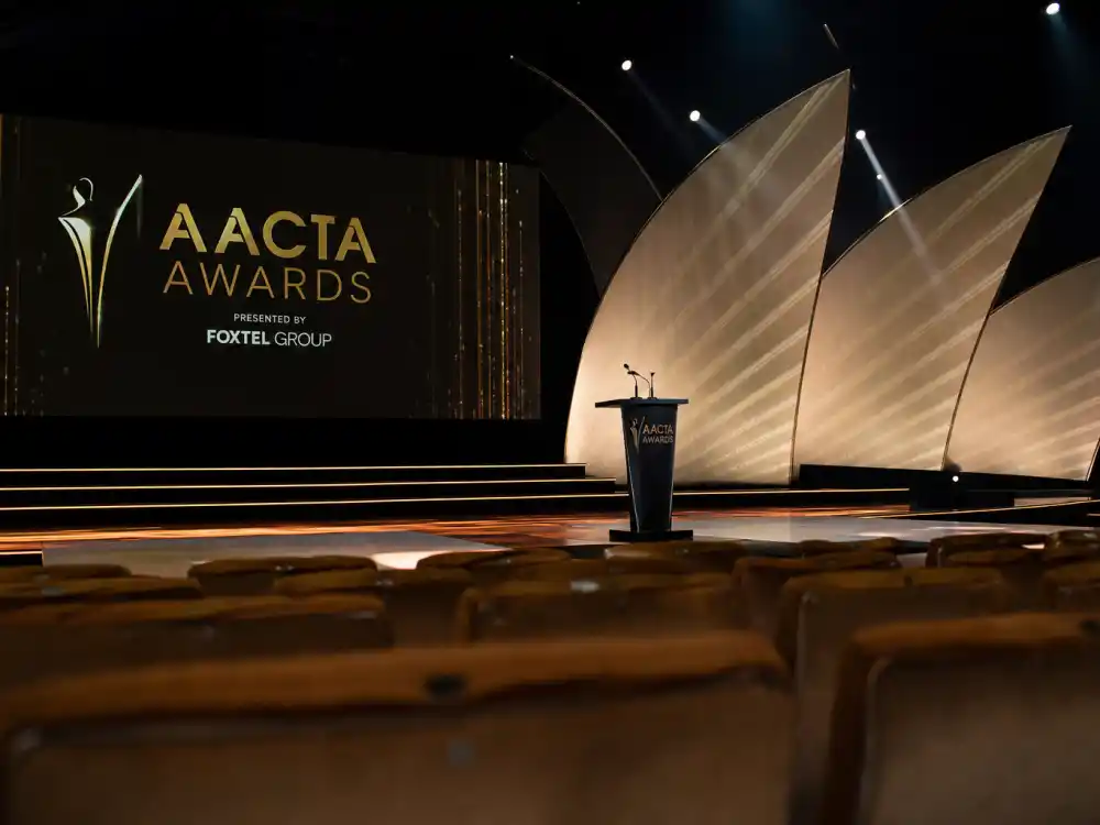 AACTA Awards Australia ceremony stage for international award shows Americans should know — Sydney theater podium with Australian film and television awards lighting
